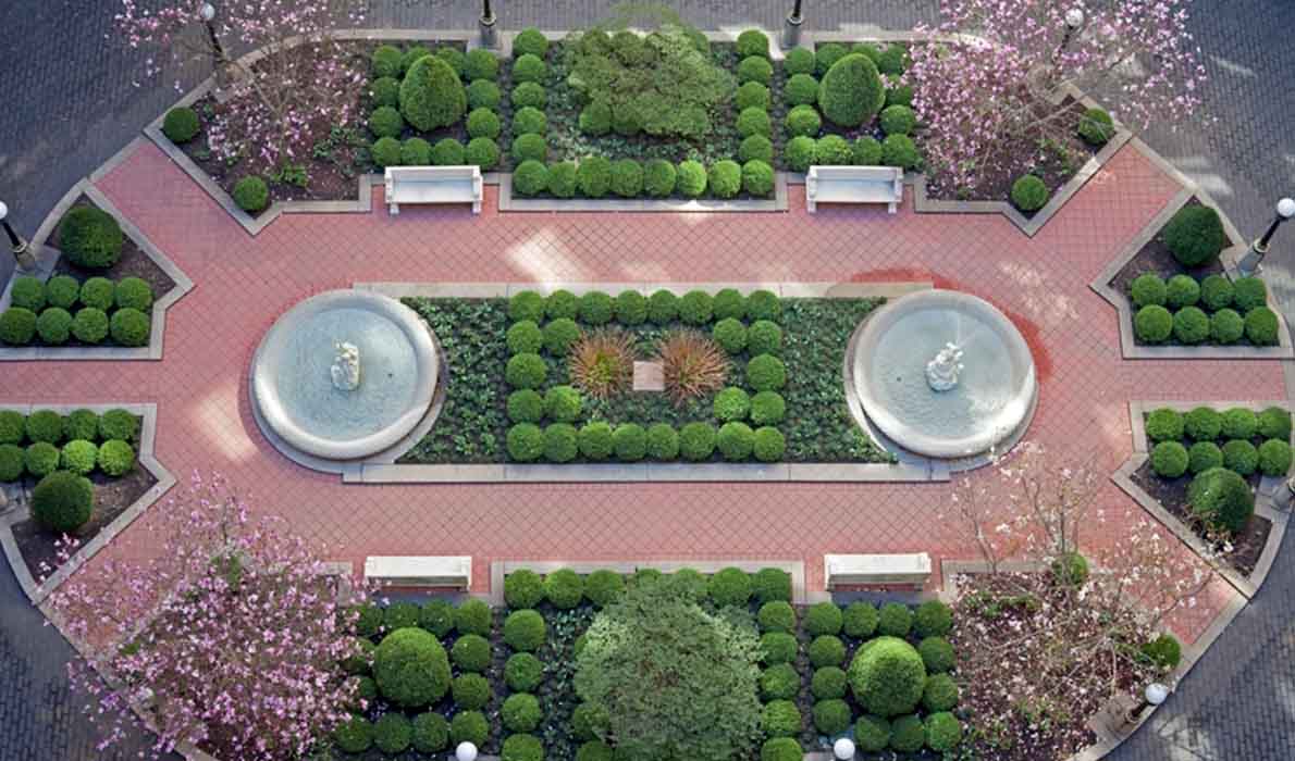 Glass-walled conference room in a modern NYC office built by Universal Management, showcasing high-end commercial construction and interior design.