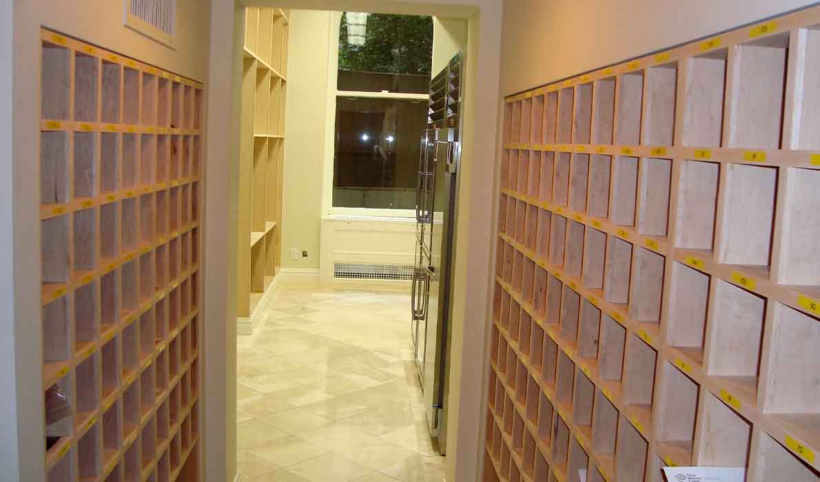 Luxury apartment mailroom renovation at 390 West End Ave in NYC by Universal Management & Contracting Corp, featuring custom-built mail slots, modern lighting, and high-end tile flooring.